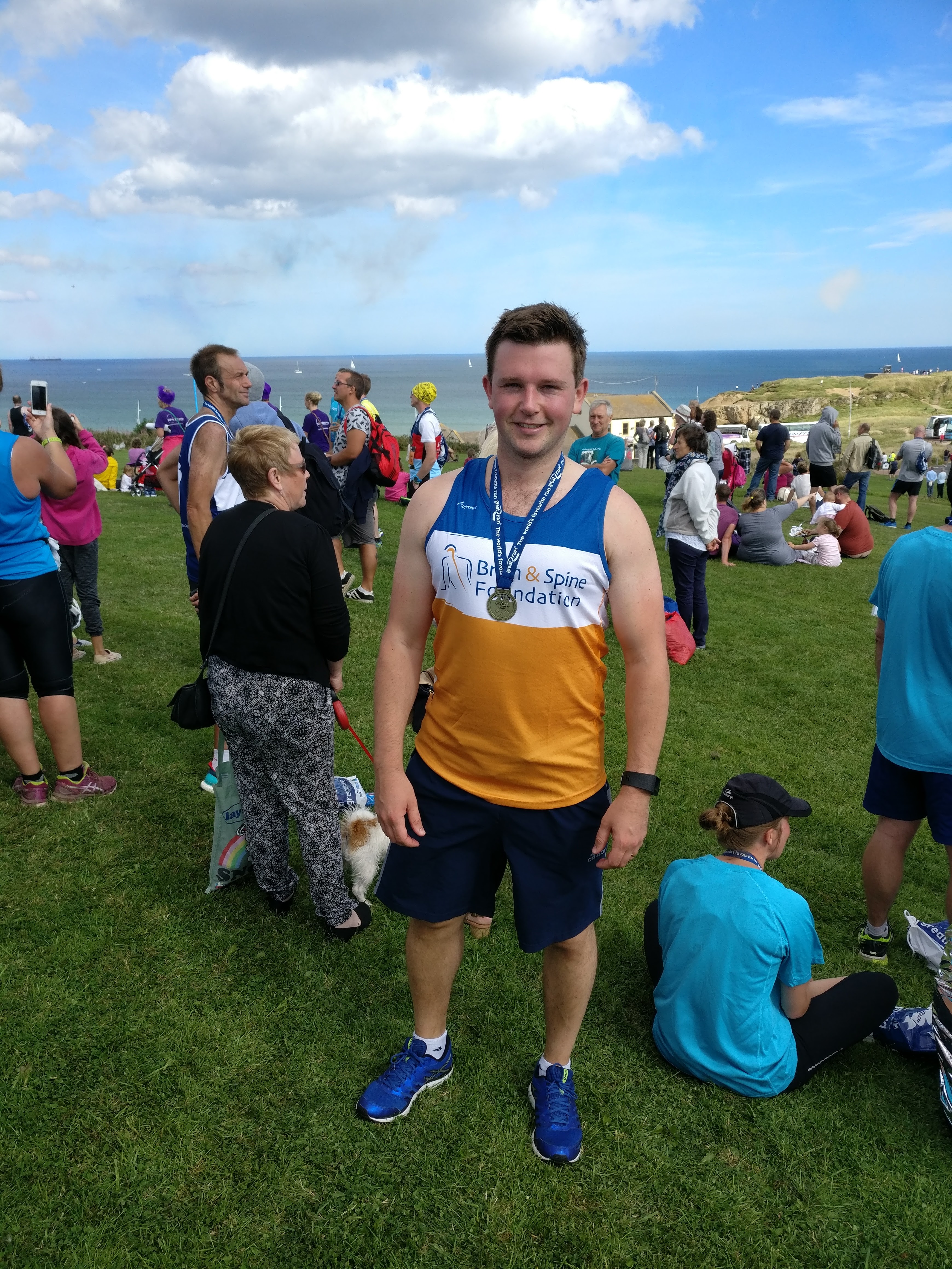 A Great North Run runner with his medal