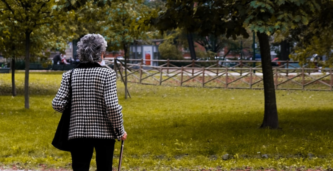 Pam walking with a stick